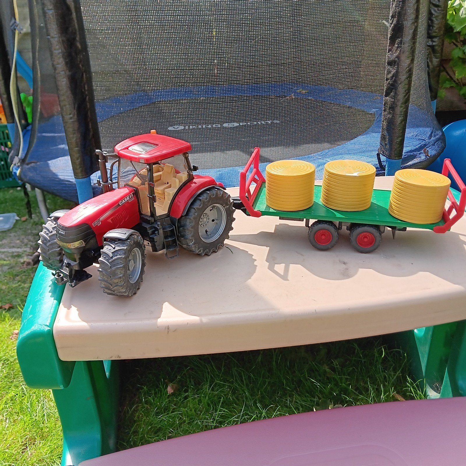 Bruder Case tractor met kar en balen, Ophalen of Verzenden, Gebruikt