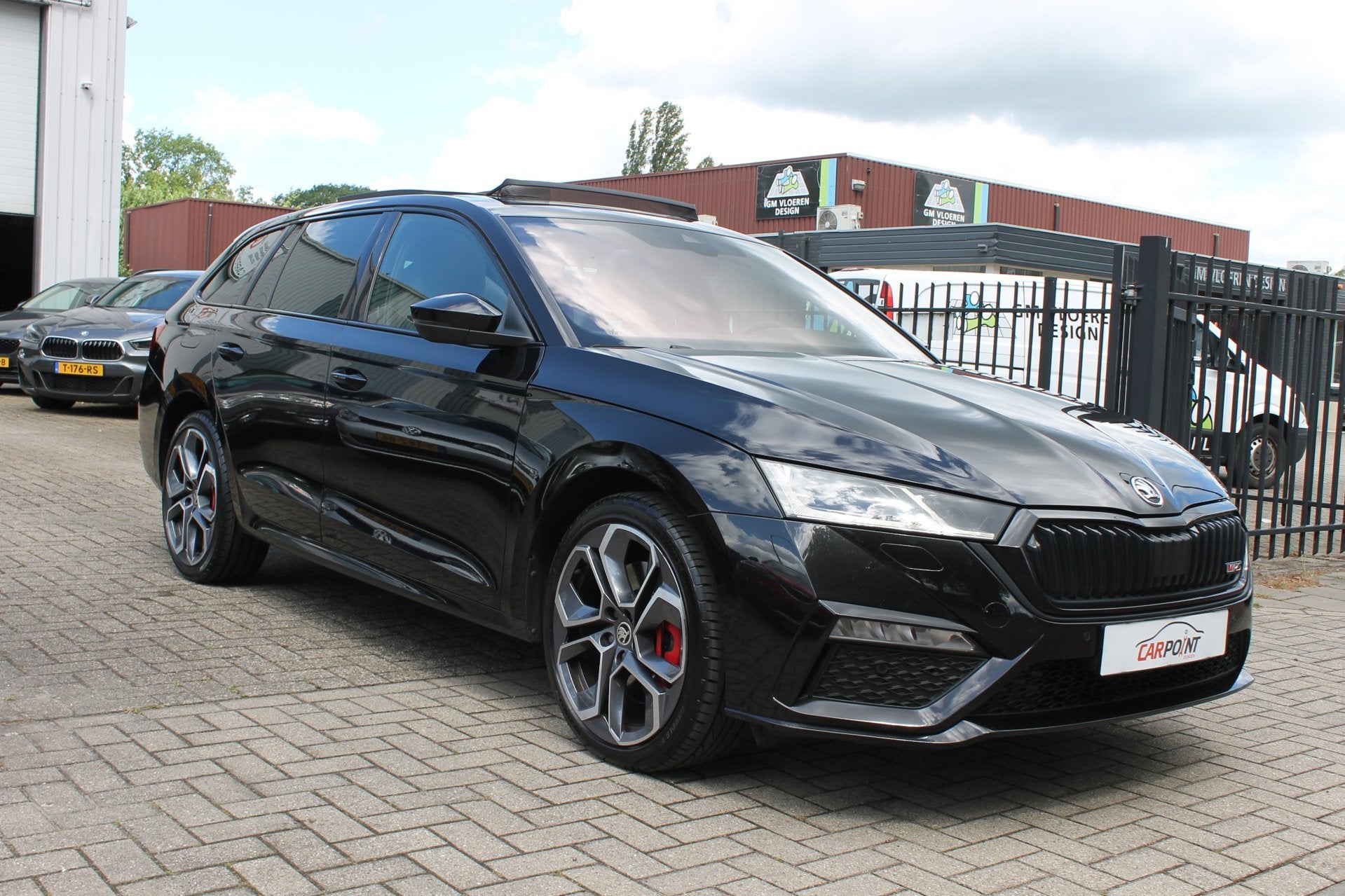 Skoda Octavia Combi 1.4 TSI RS iV PHEV Business Pano HUD Mas, Auto's, Dealer onderhouden, Gebruikt, Zwart, 4 cilinders
