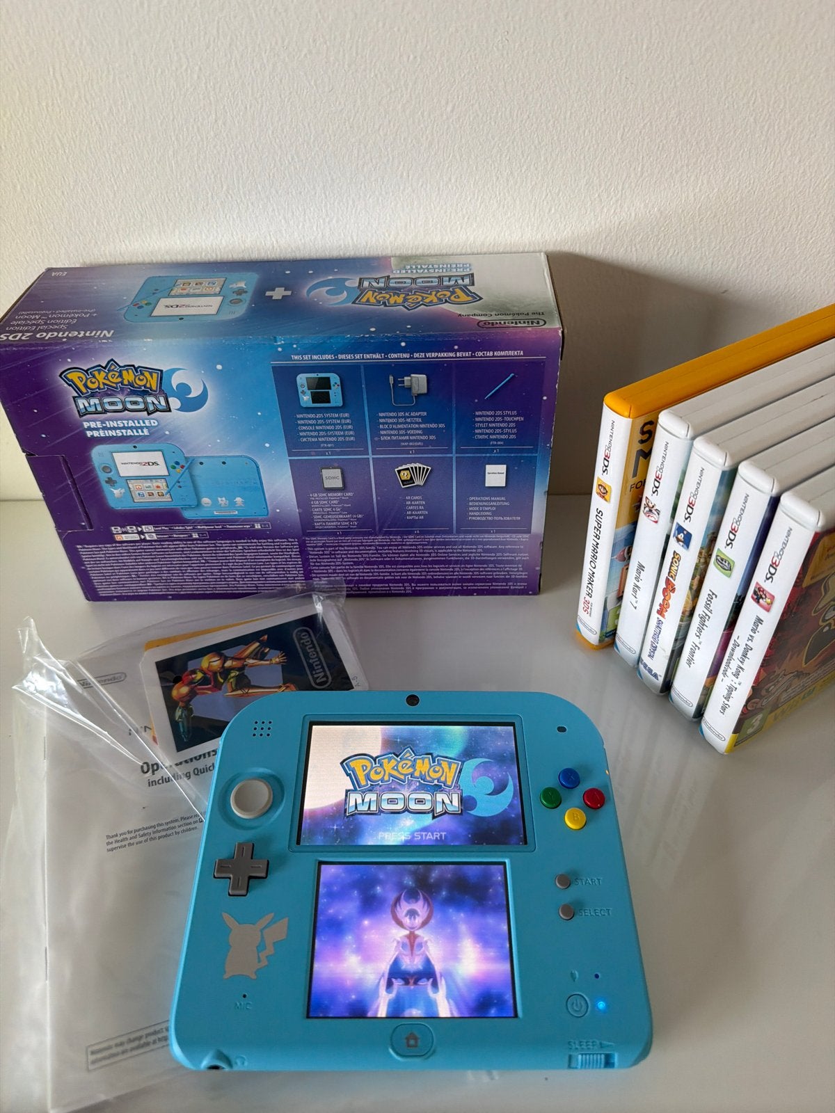 Nintendo 2DS Pokémon Moon Editie met games en accessoires, Met games, Blauw, 2DS, Ophalen of Verzenden