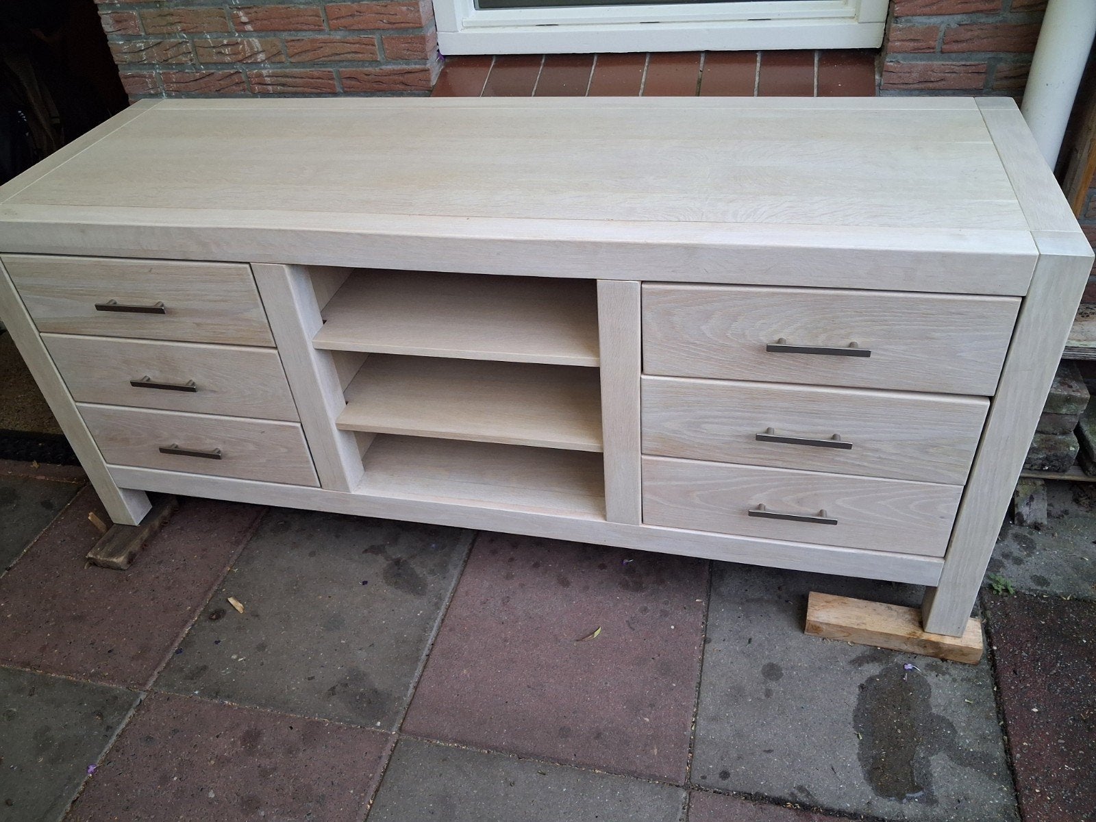 tv kast, Ophalen