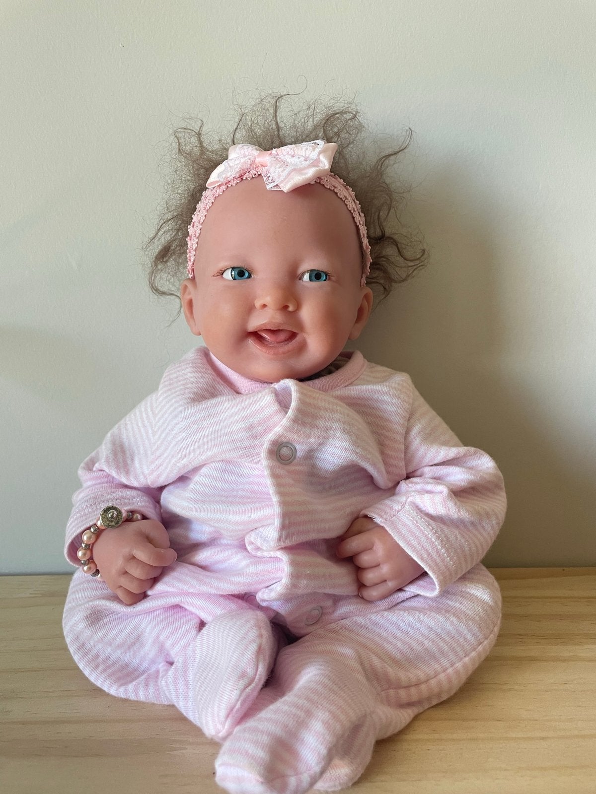 Berenguer Babypop met roze gestreepte romper, Ophalen of Verzenden, Zo goed als nieuw, Babypop