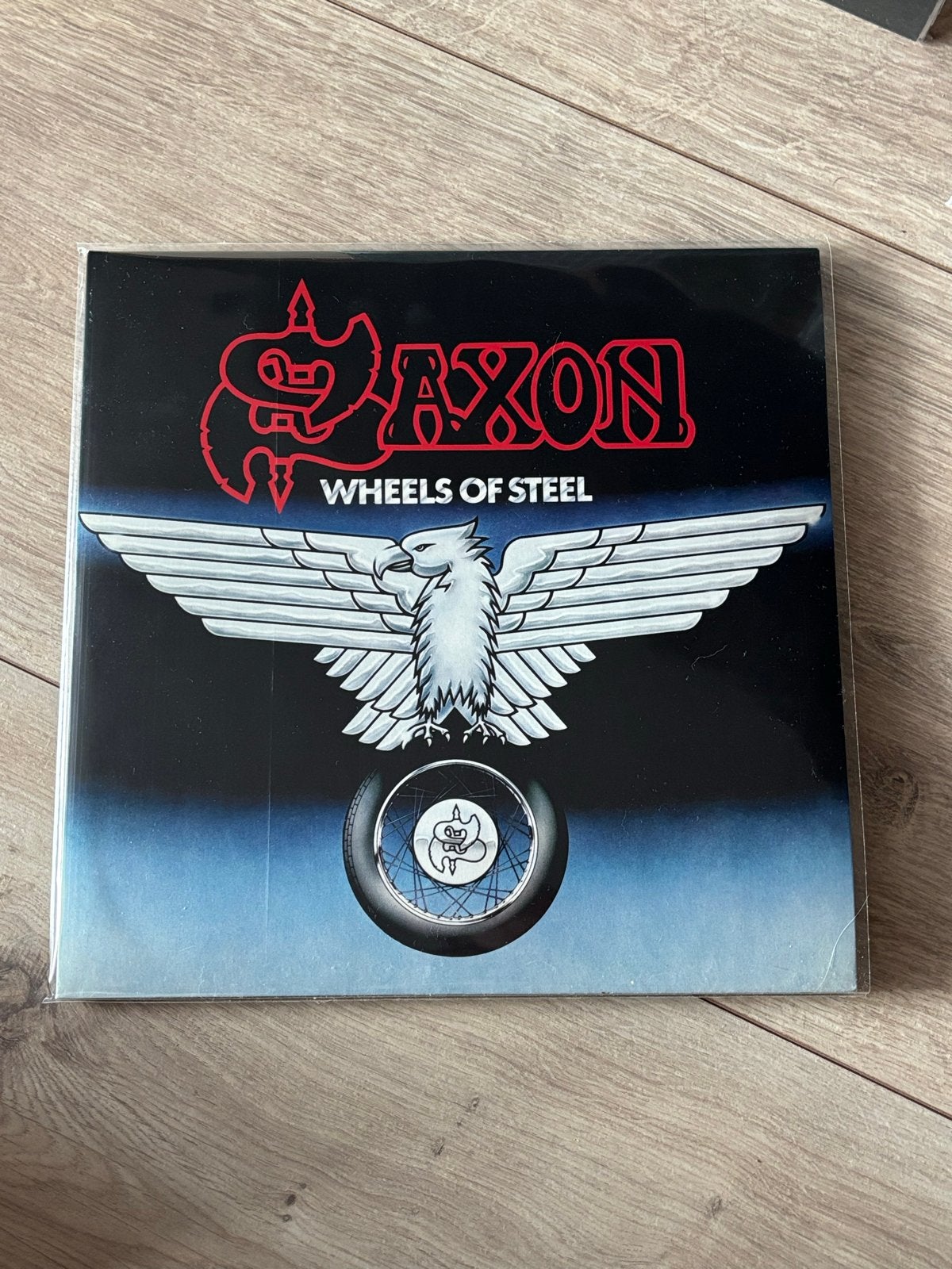 Saxon - Wheels of Steel (Rode Vinyl), LP, Hard Rock, Colored vinyl, Ophalen of Verzenden