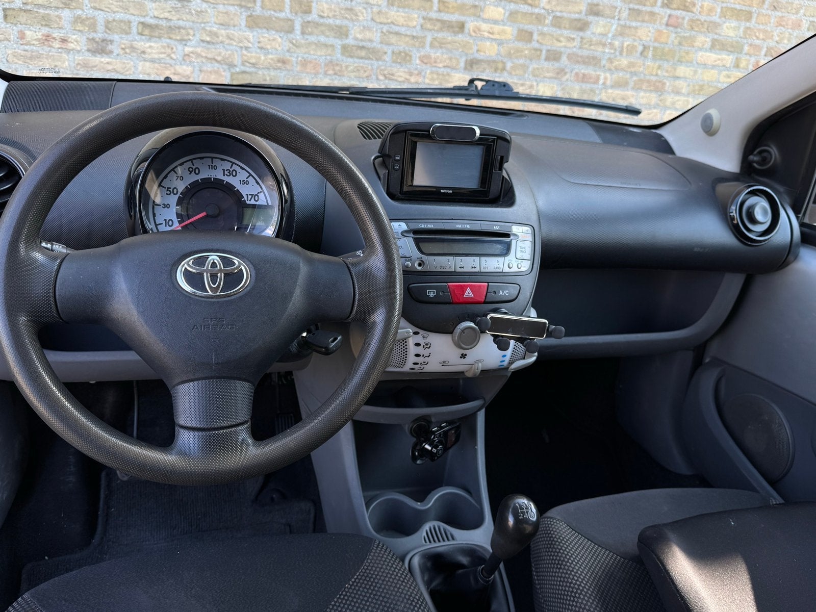 Toyota Aygo 1.0 12V Vvt-i 5DRS 2011 Grijs, Auto's, Toyota, Particulier, Aygo, Benzine, A, Hatchback, Handgeschakeld, Geïmporteerd