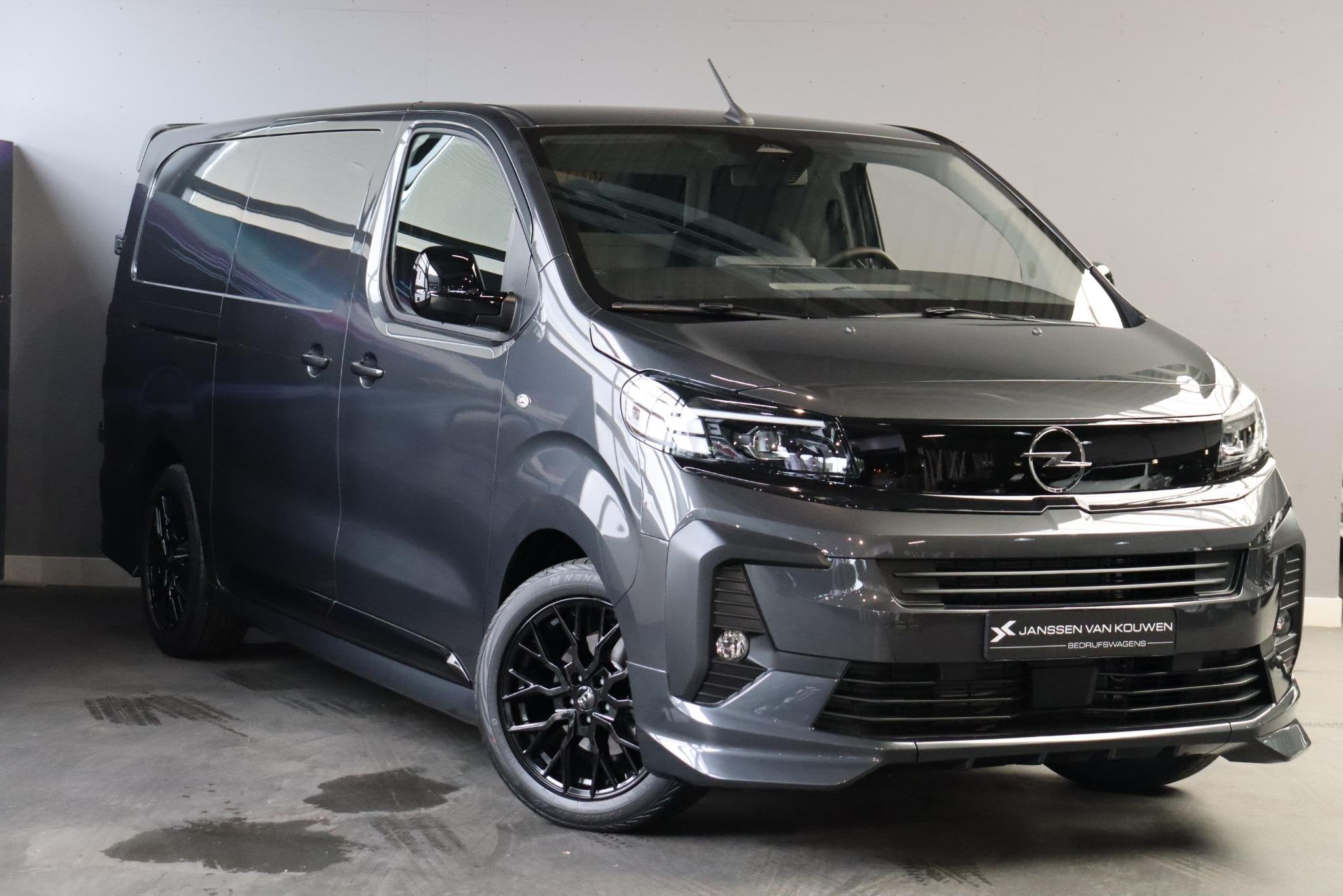 Opel Vivaro Electric L3 75 kWh STX / 0% rente / 2+6 jaar gar, Auto's, 12 maanden, Zwart, 2 stoelen, Zilver of Grijs