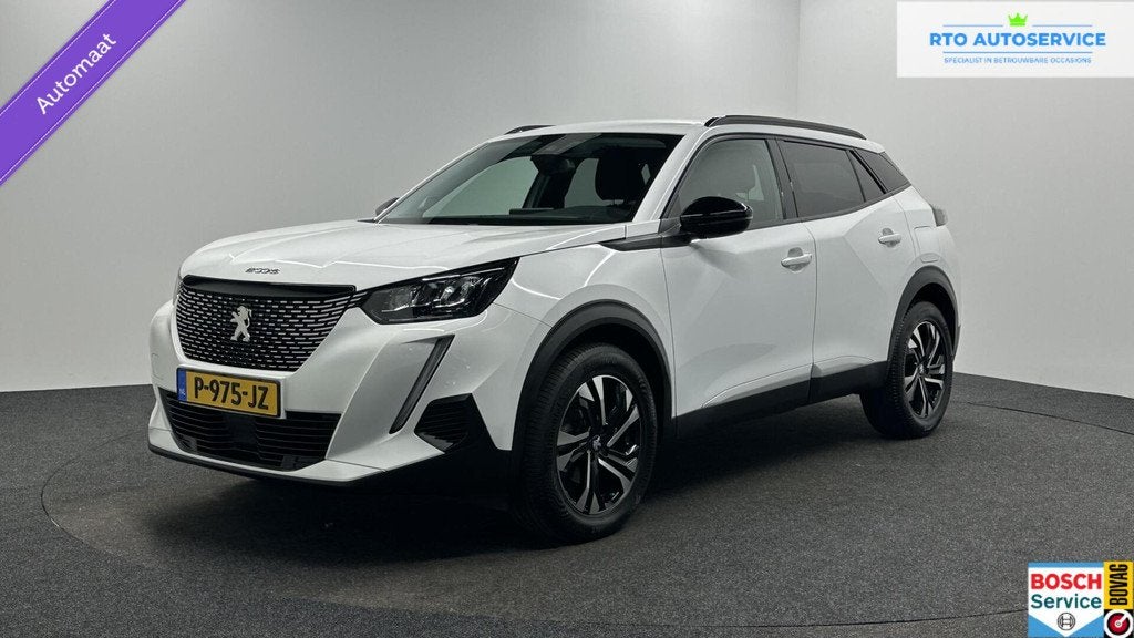 Peugeot 2008 1.2 PureTech Allure Pack CAMERA ECC CRUISE LM N, Auto's, Peugeot, Gebruikt, 1199 cc, Met garantie (alle), Leder en Stof