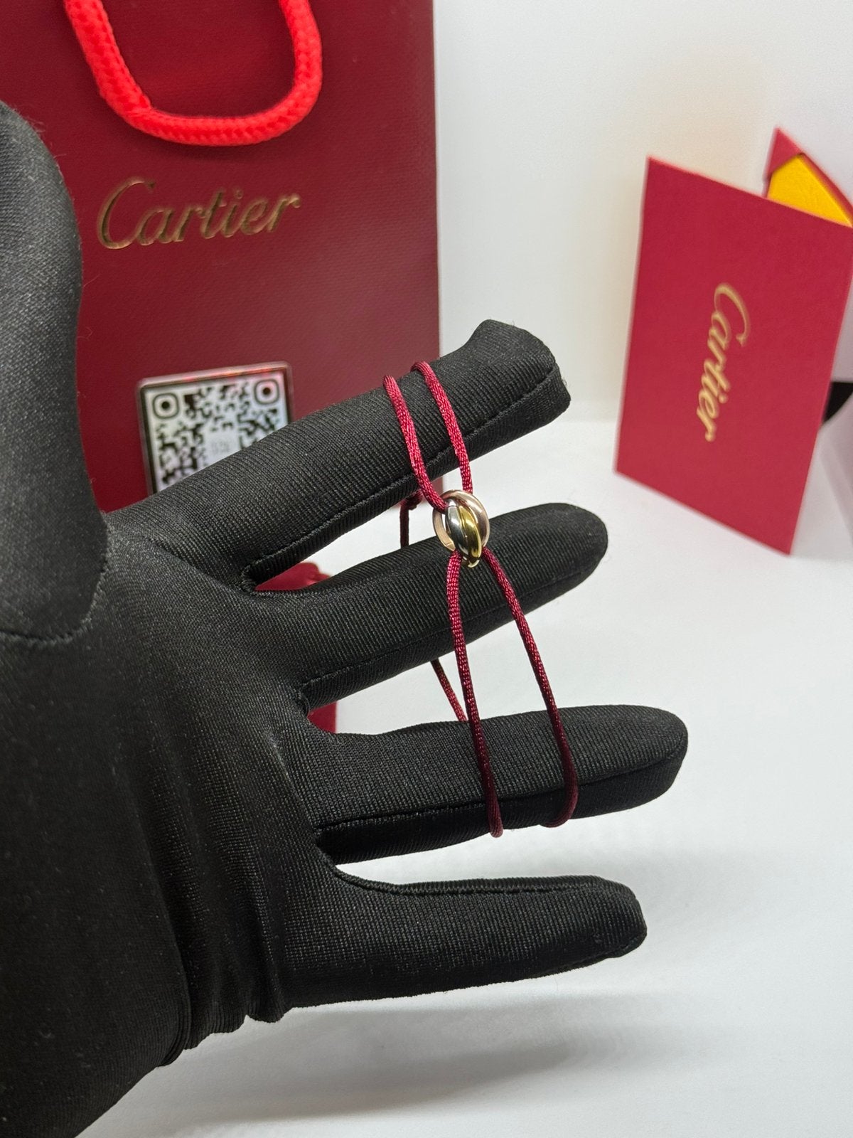 CARTIER TRINITY RODE-ARMBAND, Ophalen of Verzenden, Zo goed als nieuw, Rood, Goud