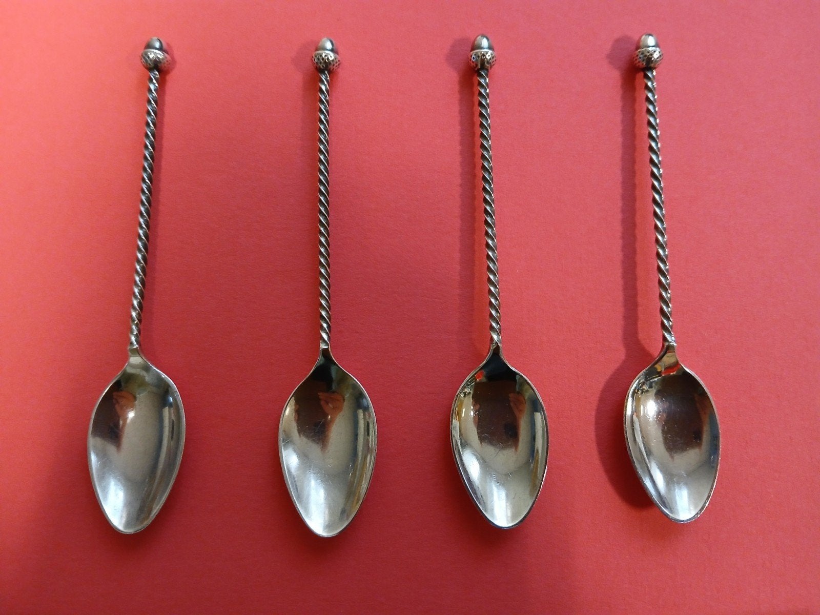 Set van 4 zilveren lepeltjes met gedraaide steel, Antiek en Kunst, Ophalen of Verzenden