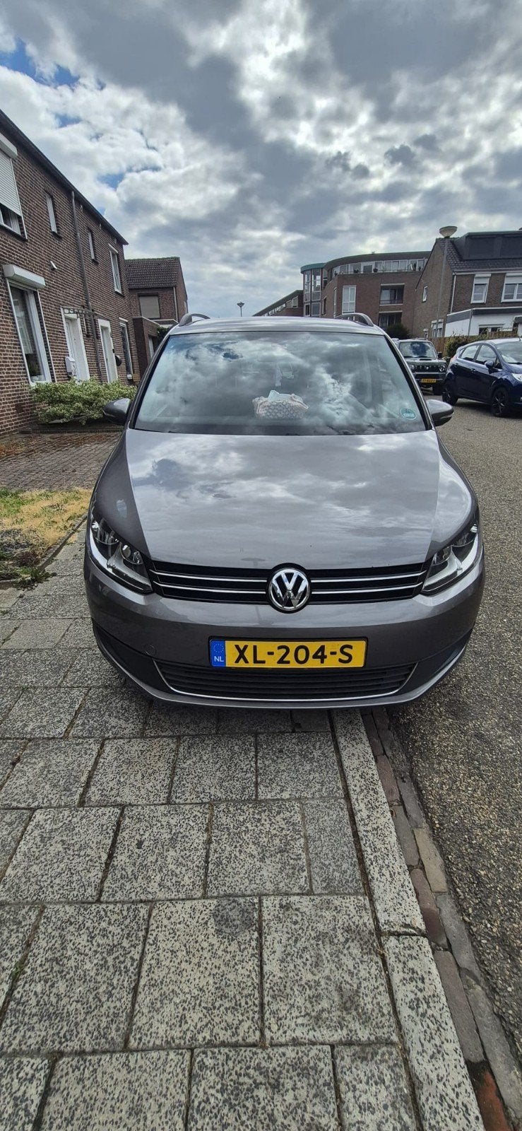 Volkswagen Touran 1.2 TSI 77KW BMT 7P 2010 Grijs, Auto's, Voorwielaandrijving, 4 cilinders, 7 stoelen, 75 €/maand