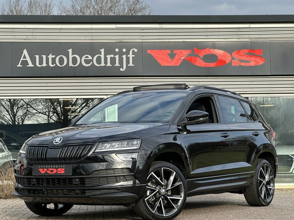 Skoda Karoq 1.5 TSI ACT Sportline | Panodak | ACC | Camera |, Auto's, Skoda, Stof, 4 cilinders, Automatische klimaatregeling, Zwart