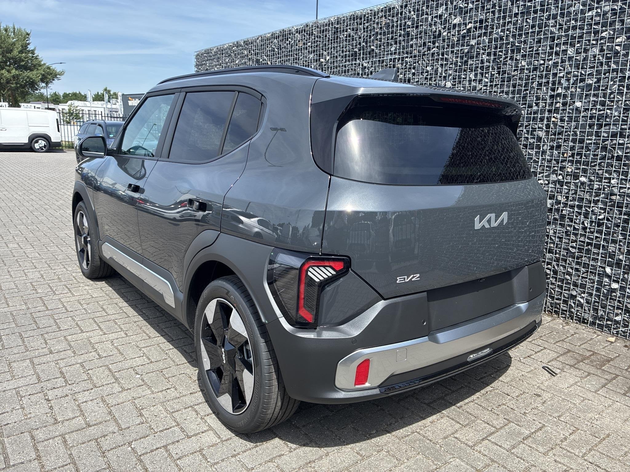 Kia EV2 Plus Advanced 42.2 kWh Open Dak | Adapt. Cruise | St, Auto's, Stof, Zilver of Grijs, Te koop, 750 kg