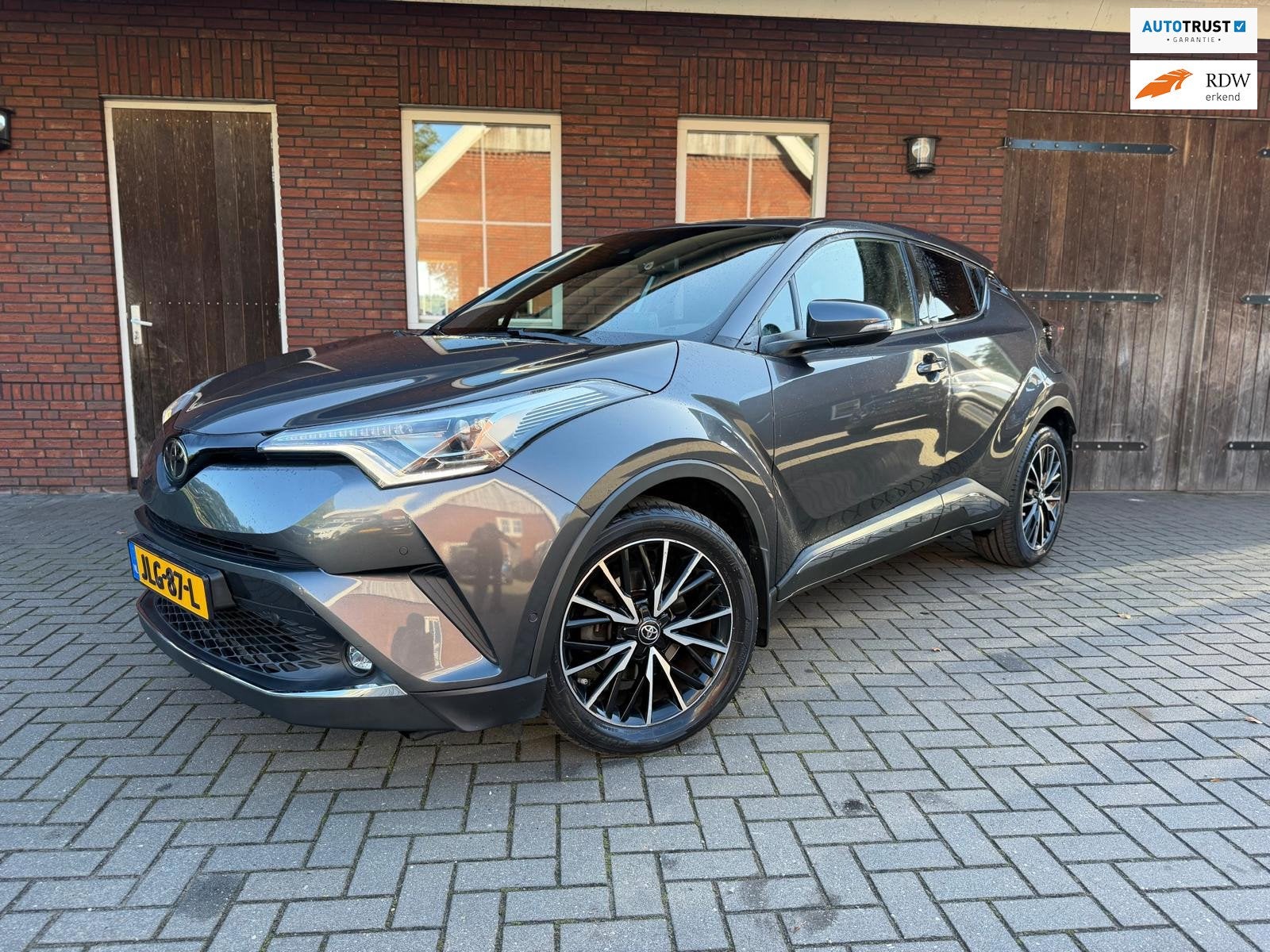 Toyota C-HR 1.2 Executive Automaat |ACC| Camera| Leder| DAB|, Auto's, Dealer onderhouden, Gebruikt, Zwart, 4 cilinders