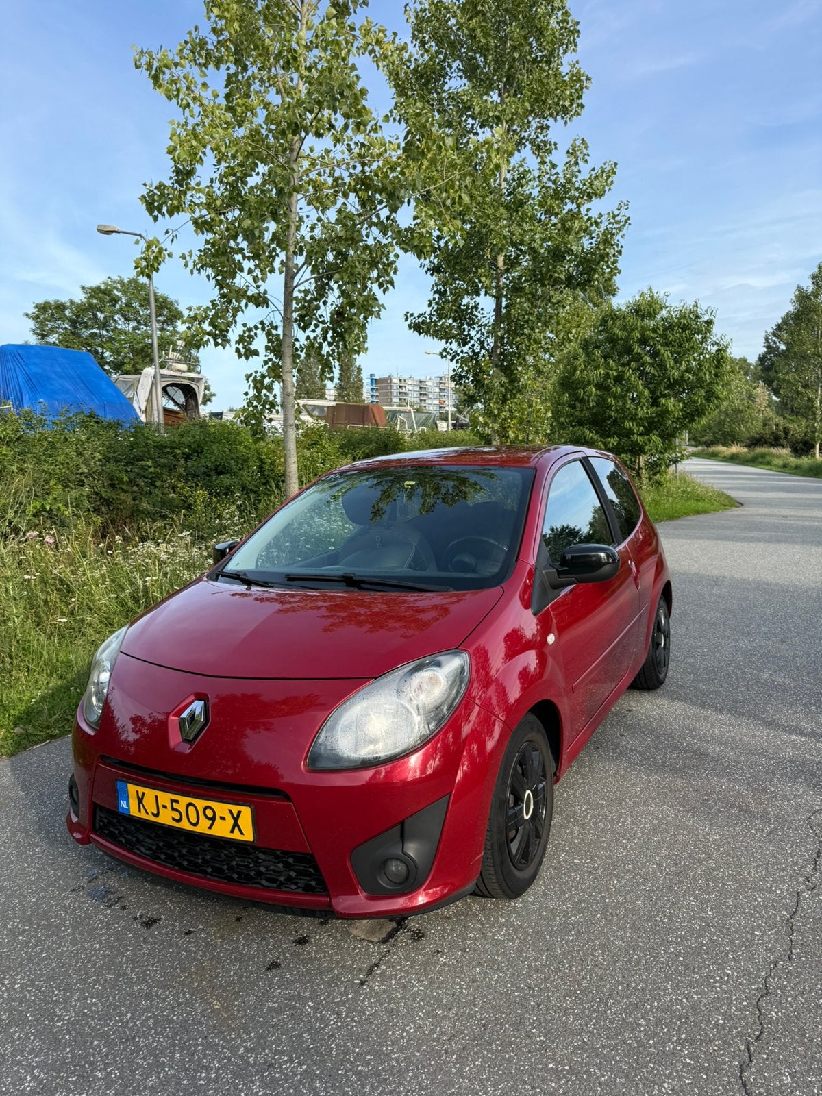 Renault Twingo 1.2 16V 2011 Rood, Auto's, Renault, 839 kg, 74 pk, Zwart, 4 cilinders