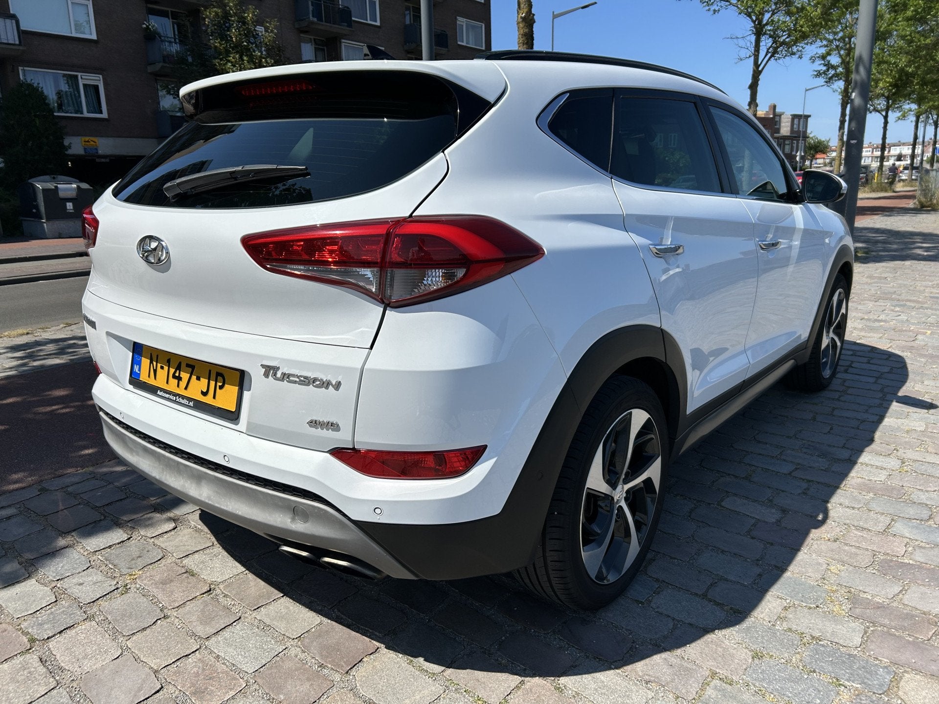 Hyundai Tucson 1.6 T-GDi Premium 4WD automaat leer airco/ecc, Gebruikt, 4 cilinders, Wit, Leder