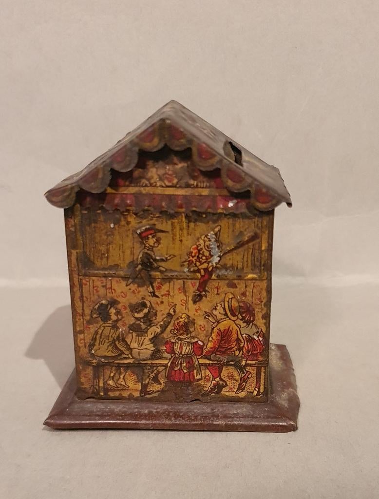 Oude blikken Pennytoy spaarpot met Poppenkast afbeeldingen., Antiek en Kunst, Ophalen of Verzenden