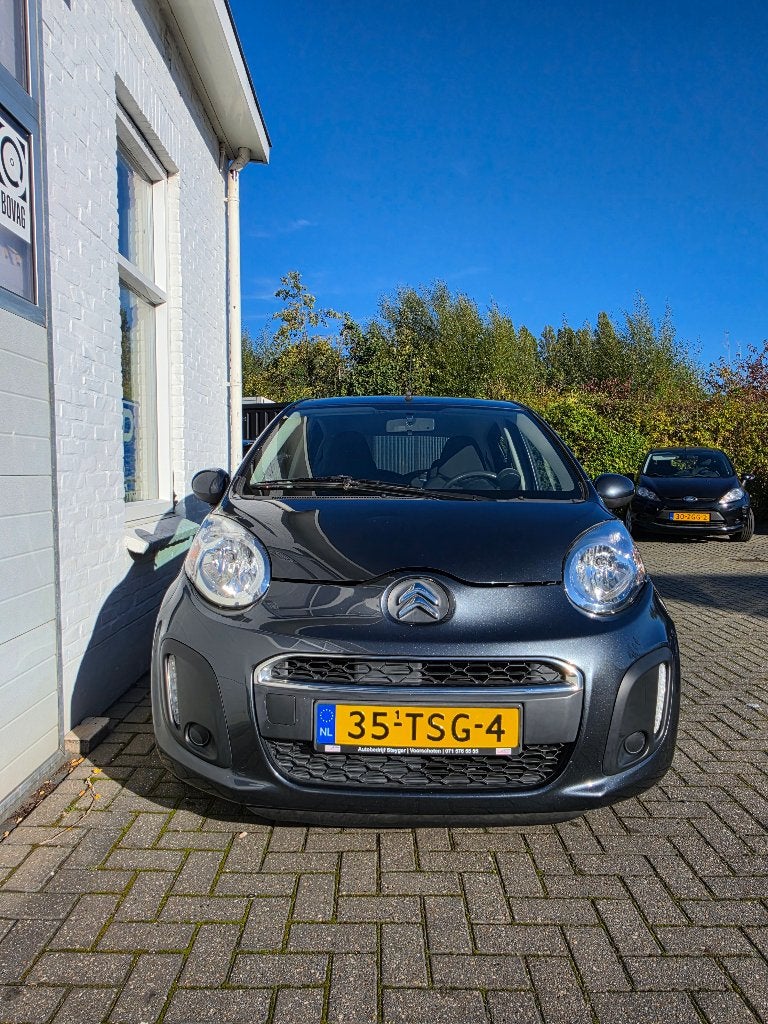 Citroën C1 1.0i 68PK 5-DRS 2012 Grijs, Auto's, Voorwielaandrijving, Euro 5, Stof, Zwart