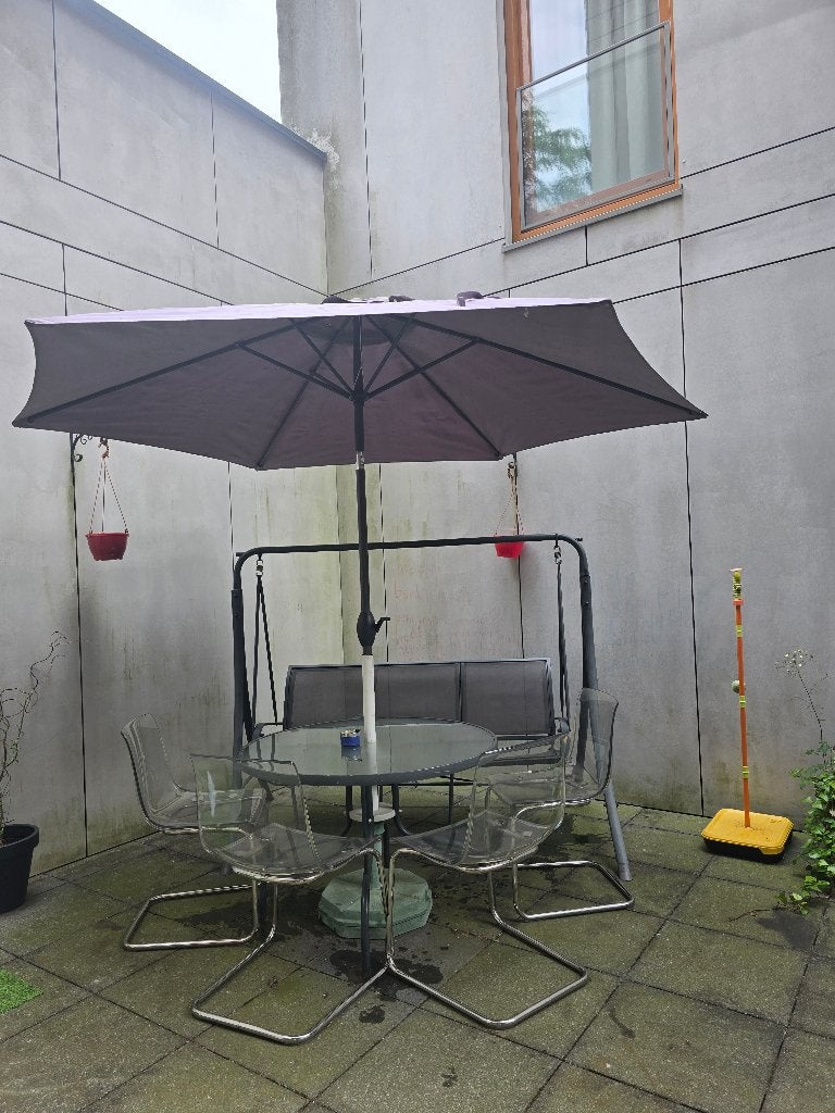 Tuinset met glazen tafel, 4 stoelen en grote parasol, Ophalen, Gebruikt