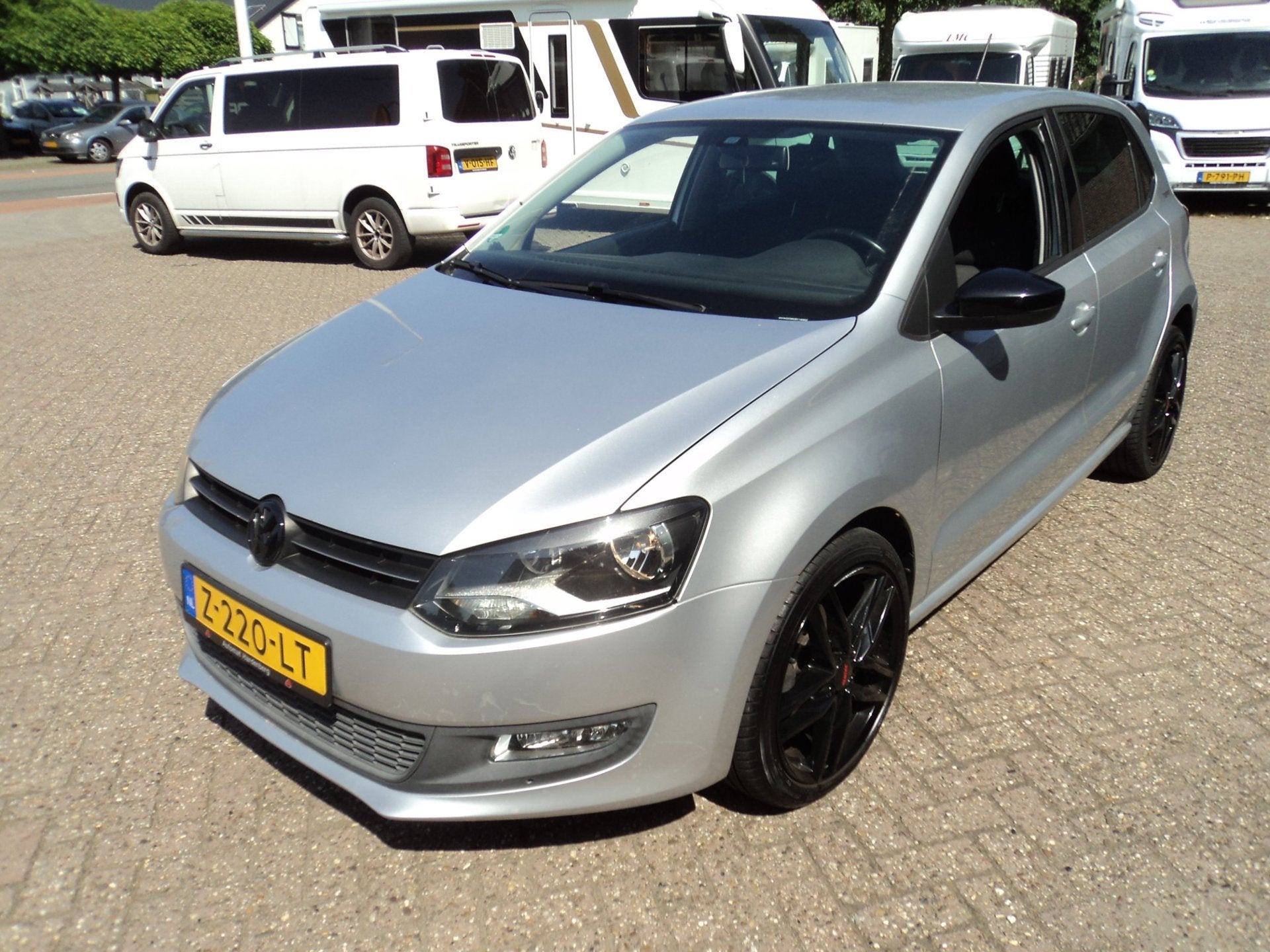 Volkswagen Polo 1.2 TSI Comfortline Automaat Cruise Clima St, Euro 5, Stof, Zwart, 4 cilinders