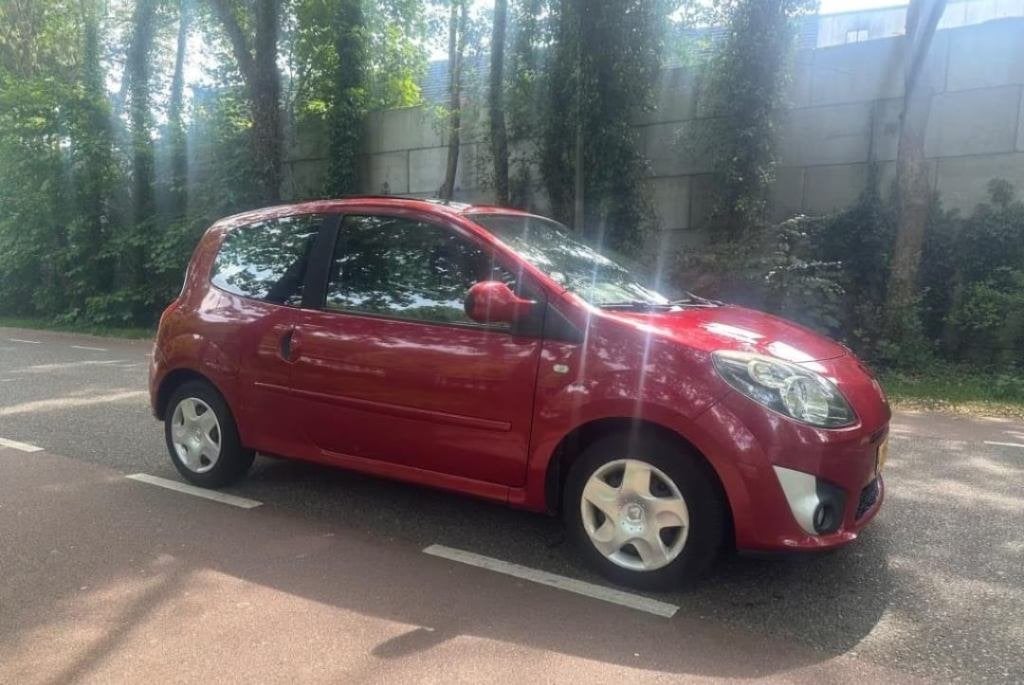 Renault Twingo 1.2 16V CO2 2009 Rood, Auto's, Renault, Voorwielaandrijving, Euro 5, 31 €/maand, 4 stoelen