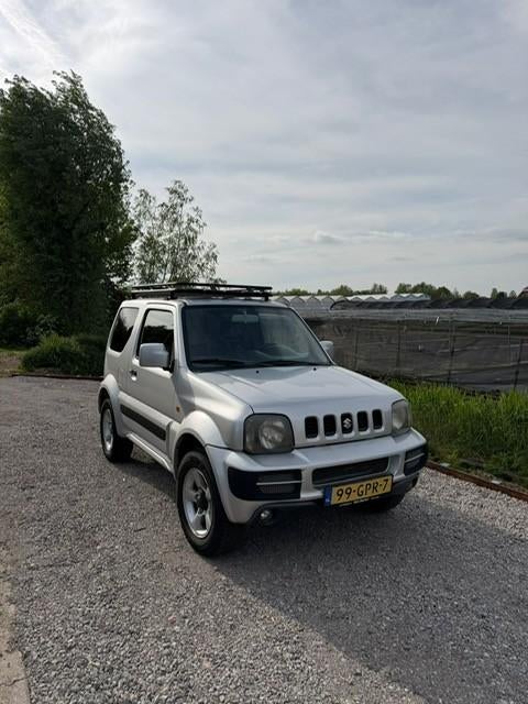 Suzuki Jimny 1.3 4WD EXLUSIVE 2008 Orig.NL-auto (NAP), Auto's, Suzuki, 1350 kg, Stof, 40 €/maand, Zwart