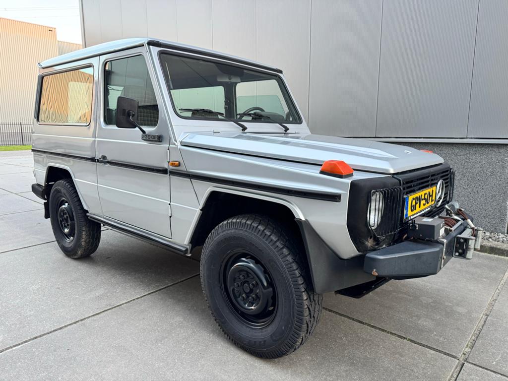 Mercedes-Benz G-klasse 230GE (belastingvrij), Auto's, Metallic lak, Zwart, 4 cilinders, G-Klasse