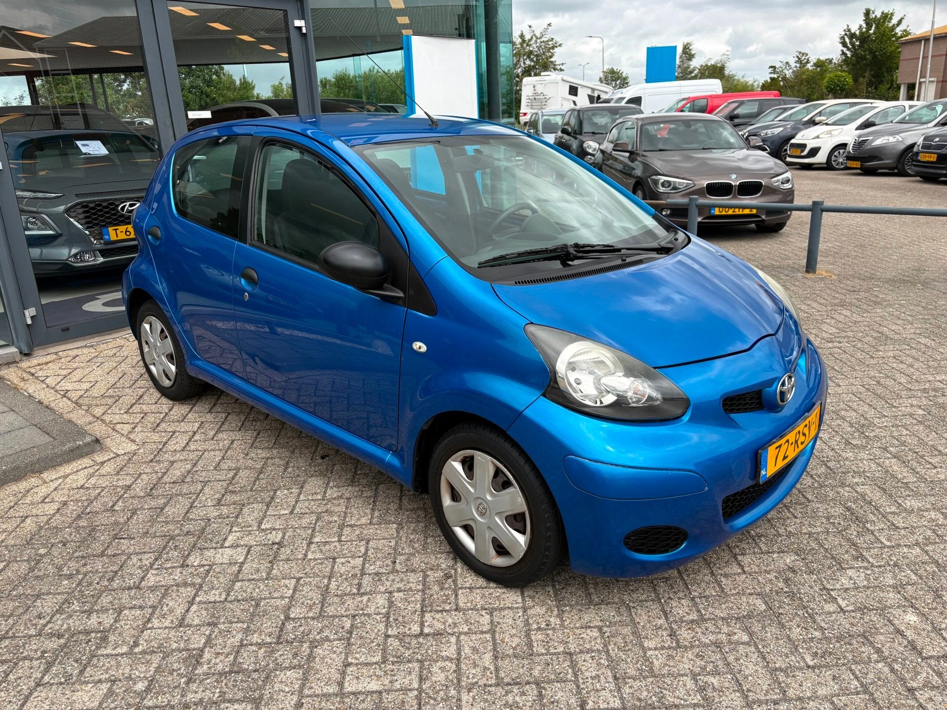 Toyota Aygo 1.0-12V Now *AC, Auto's, Toyota, Voorwielaandrijving, Euro 5, Stof, Gebruikt