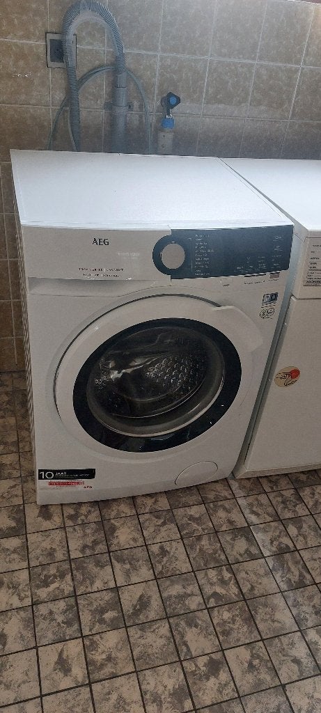 Wasmachine AEG kan in combi met AEG droger, Witgoed en Apparatuur, Wasmachines, Zo goed als nieuw, Voorlader, 6 tot 8 kg, 85 tot 90 cm