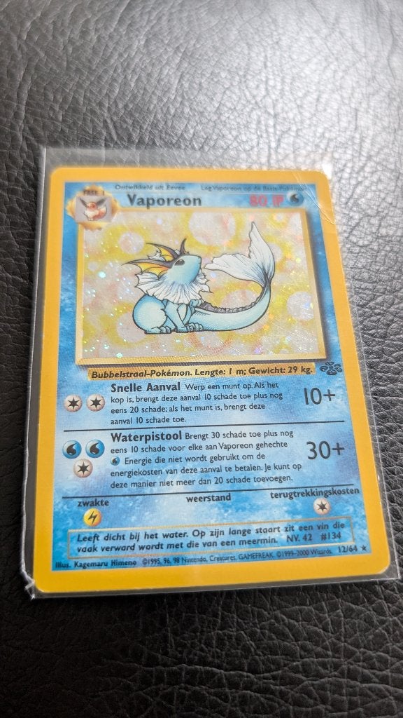 Vaporeon (Holo) Jungle set (12/64), Ophalen of Verzenden, Zo goed als nieuw