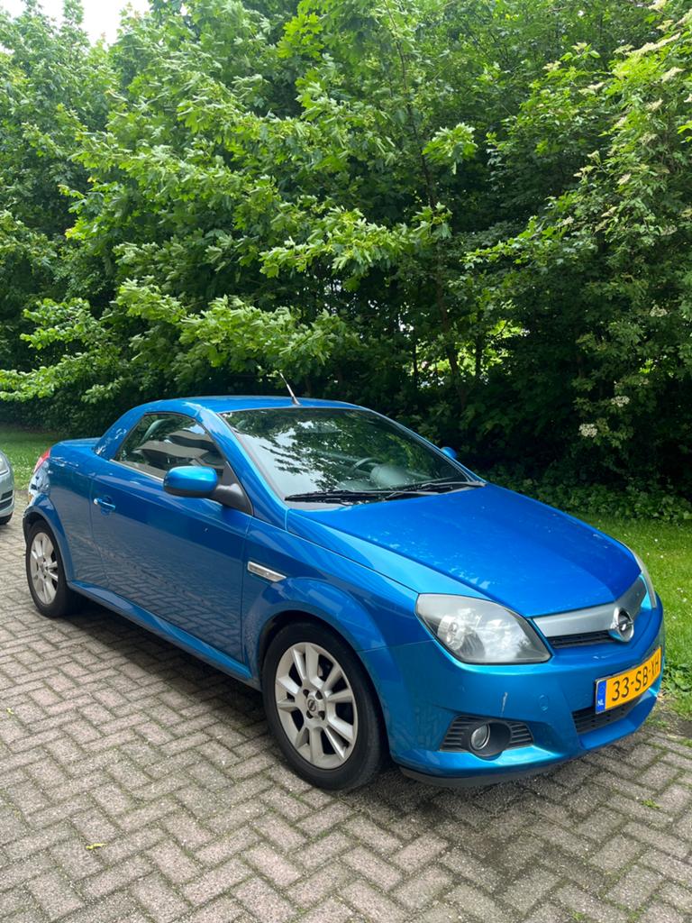 Opel Tigra 1.8 16V Twintop 2005 Blauw, Auto's, 4 cilinders, Blauw, 1796 cc, Origineel Nederlands