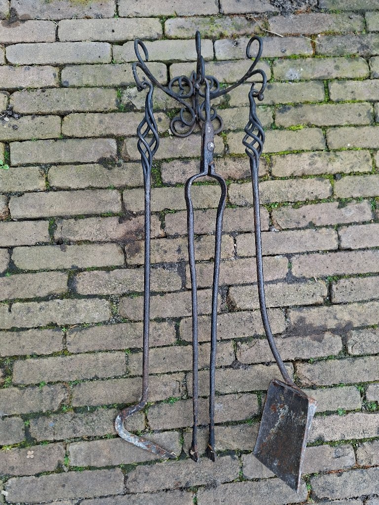 Smeedijzer haardstel, Ophalen
