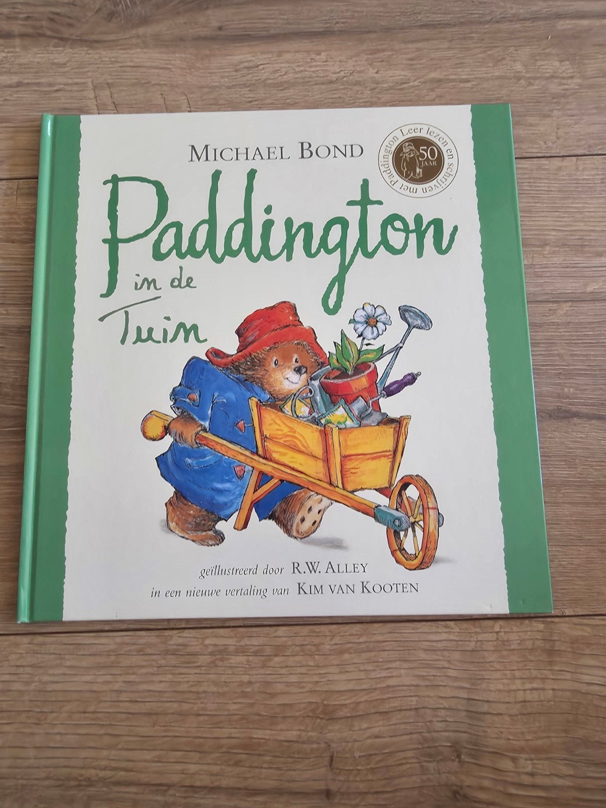 Paddington in de tuin, Ophalen of Verzenden, Zo goed als nieuw, Michael Bond, Prentenboek