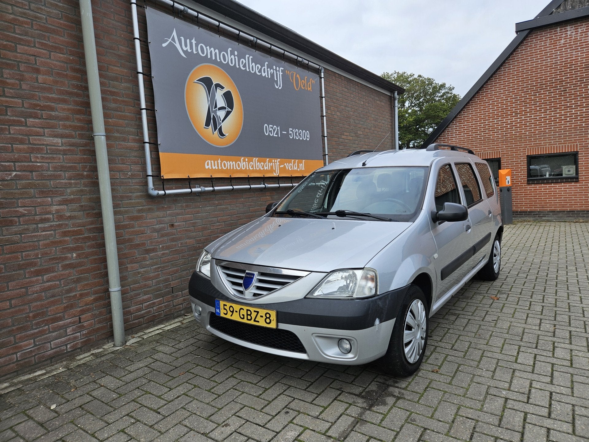 Dacia Logan MCV 1.6 Lauréate (bj 2008), Auto's, Stof, Gebruikt, 4 cilinders, 620 kg