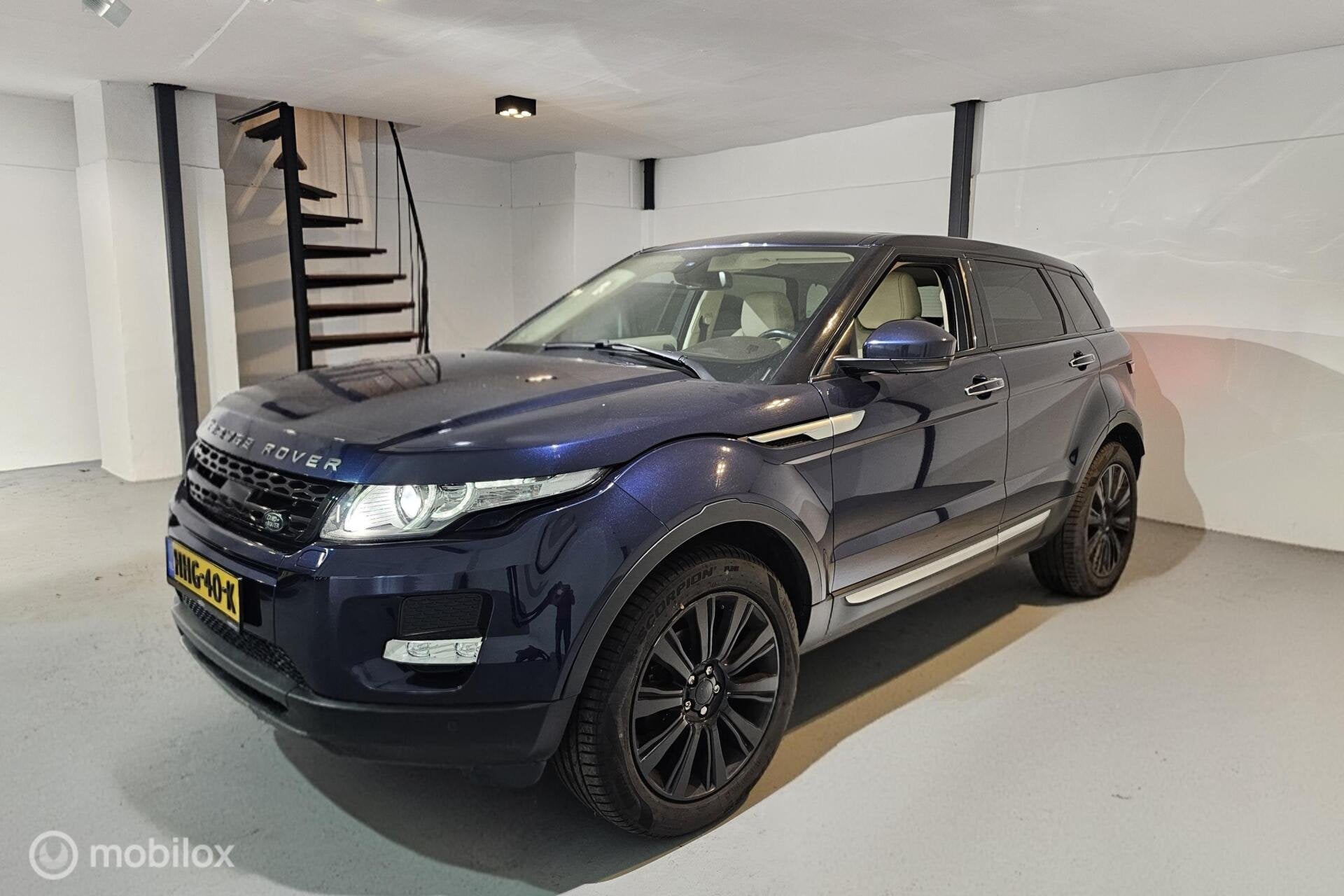 Land Rover Range Rover Evoque 2.0 Si 4WD Autobiography, Auto's, Automaat, Euro 5, 4 cilinders, Blauw