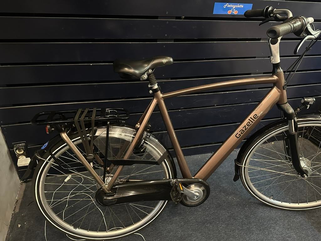 Gazelle orange C7 plus 61cm of 57cm show model met garantie, Ophalen, Zo goed als nieuw, Gazelle