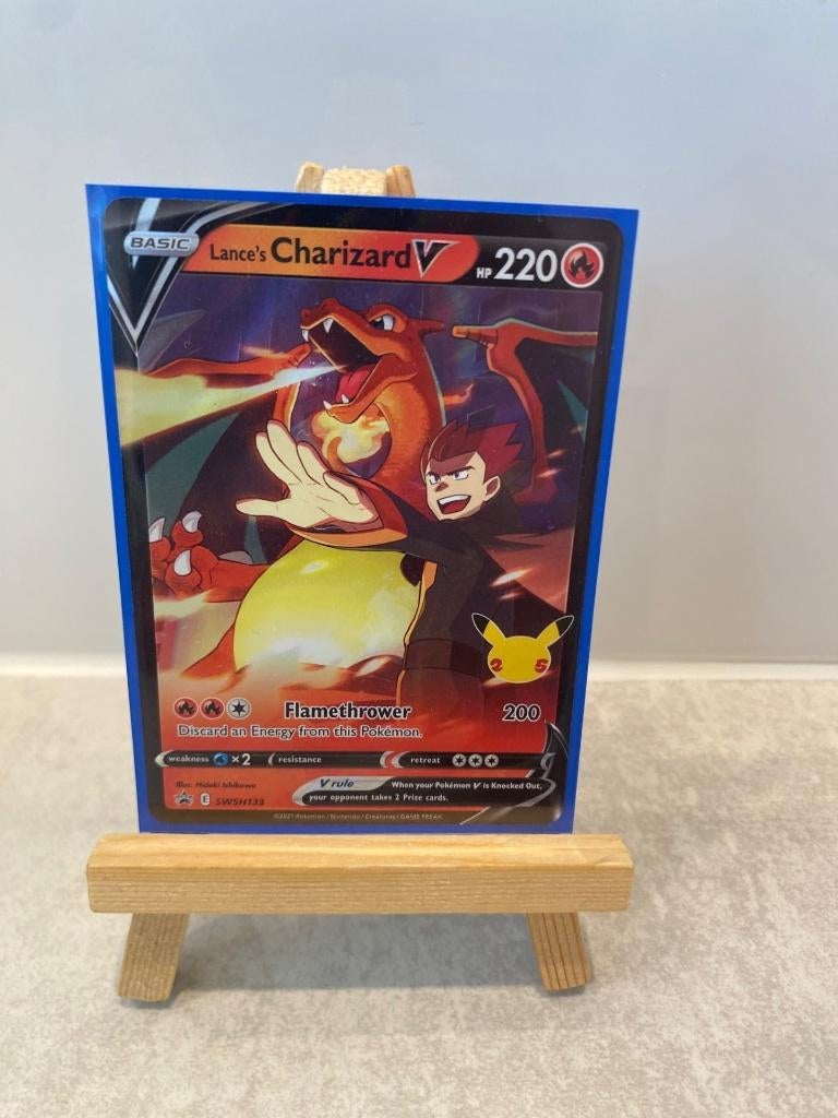 ** Charizard 8/9 -Lance's Charizard SWSH Black Star Promos**, Ophalen of Verzenden, Zo goed als nieuw
