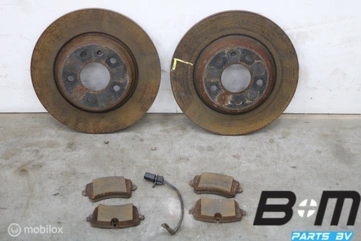 Set schijven + blokken achter Audi A6 4G 40km 8K0615601J, Gebruikt