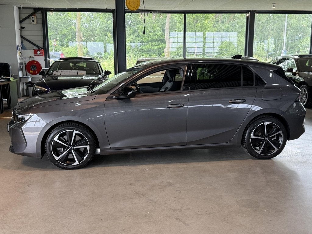 Opel Astra 1.6 turbo PHEV 133Kw Business Edition Hybride, Auto's, Opel, Stof, Gebruikt, 4 cilinders, 181 pk
