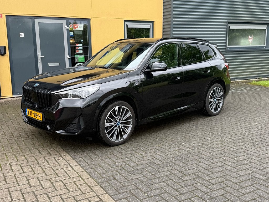 BMW X1 xDrive 30e M Sport Pro 20'' lm velgen, massage, head, Auto's, BMW, Gebruikt, Euro 6, Zwart, Bedrijf