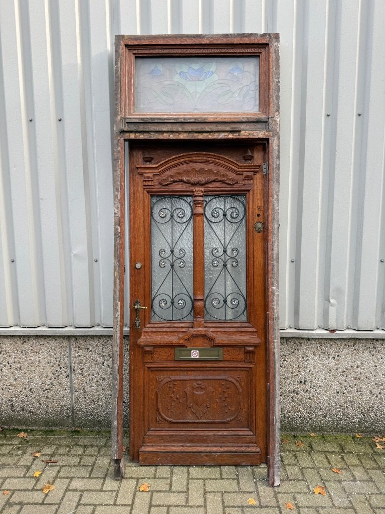 Antieke eiken voordeur uit 1880 met kozijn (glas in lood), Doe-het-zelf en Verbouw, Deuren en Horren, Zo goed als nieuw, Buitendeur