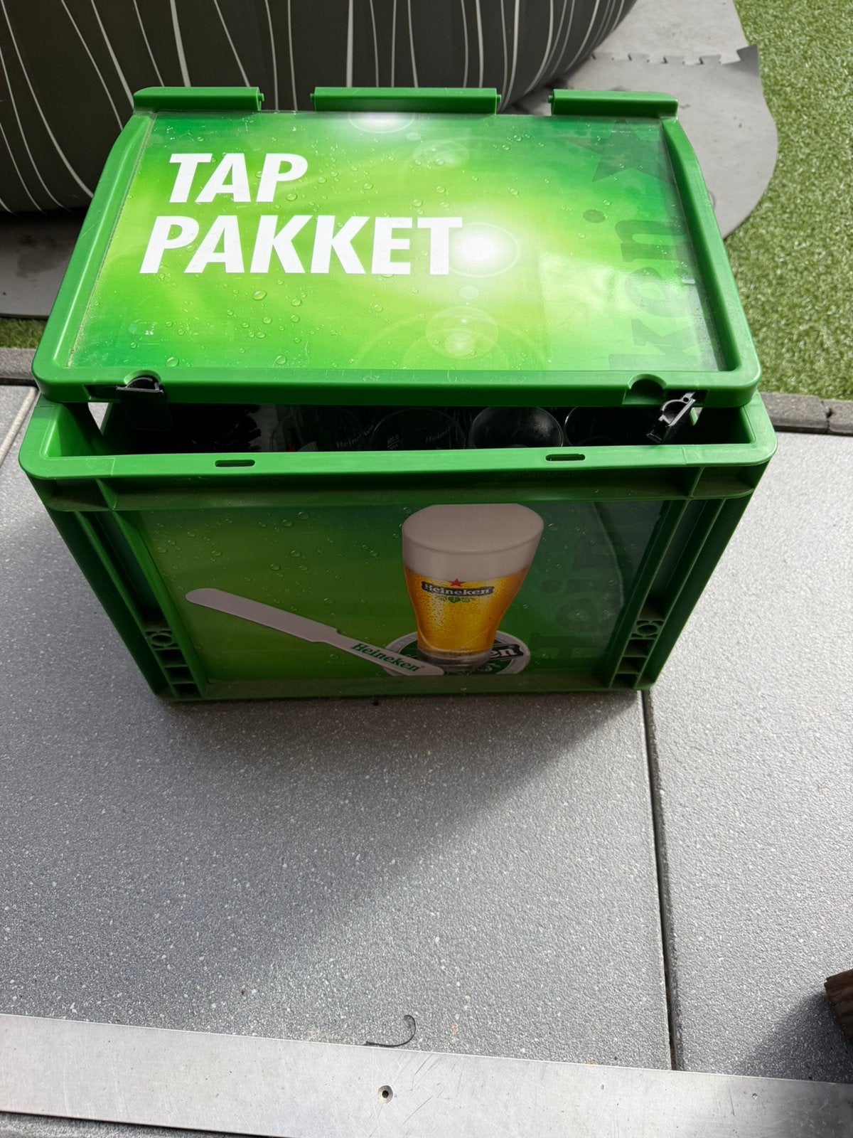 12 Heineken glazen in krat met spoelborstels, Ophalen, Gebruikt, Glas of Glazen, Heineken