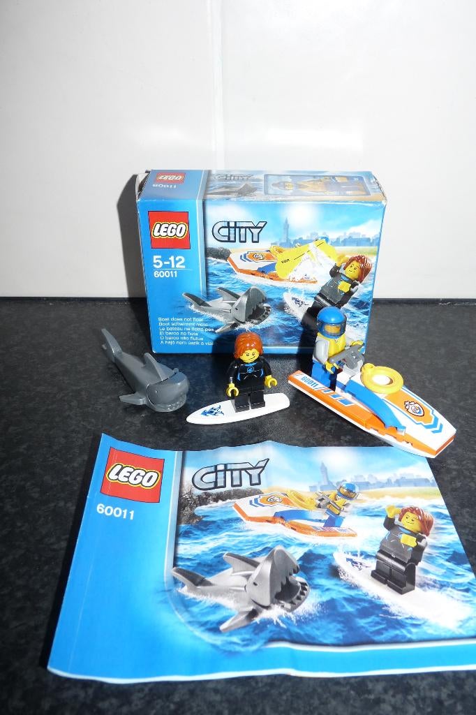 z.g.a.n Lego City 60011 Surfer Redding incl doos + boekje, City, Lego, Ophalen of Verzenden, Zo goed als nieuw