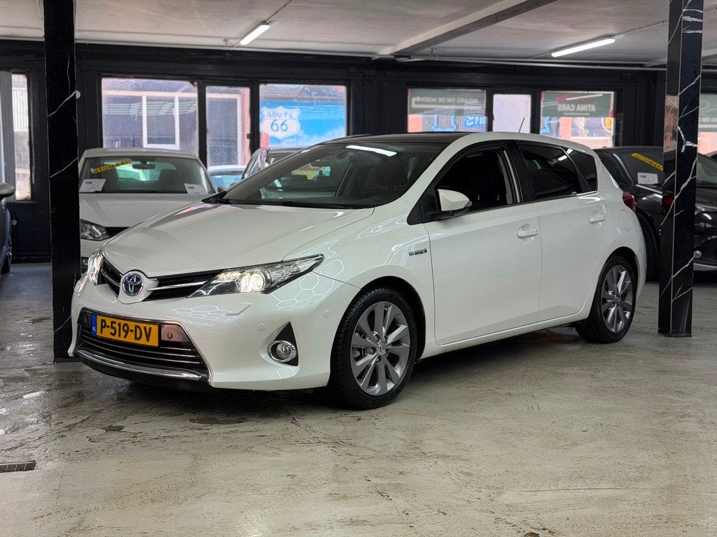 Toyota Auris 1.8 Hybrid Dynamic vol opties, Auto's, Toyota, Euro 5, Gebruikt, 4 cilinders, Wit