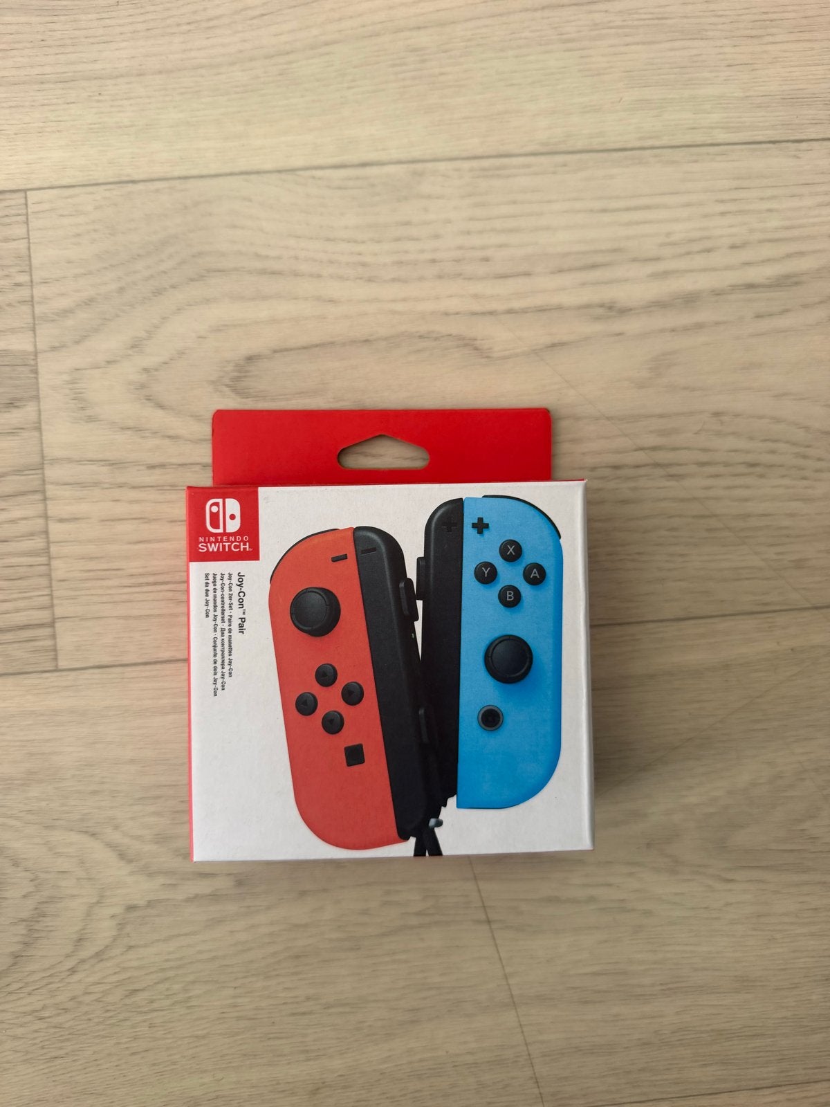 Nintendo Switch Joy-Con Controllers - Rood/Blauw, Spelcomputers en Games, Ophalen of Verzenden, Nieuw, Met 2 controllers