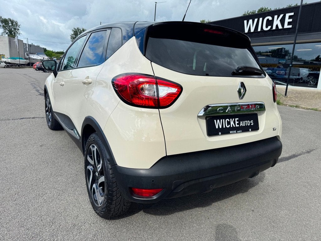 Renault Captur 1.2 TCe Dynamique Helly Hansen Automaat Navi, Auto's, Gebruikt, 4 cilinders, Wit, Origineel Nederlands