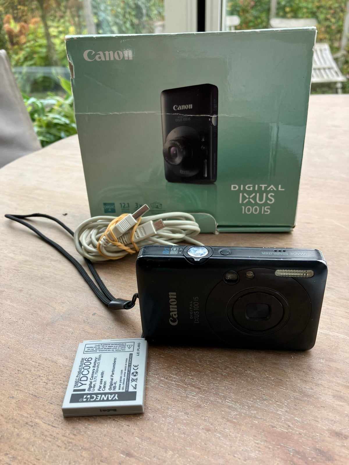 Te koop:Camera digital  Ixus 100 IS zwart, Ophalen of Verzenden, Gebruikt, Compactcamera, Minder dan 4 keer