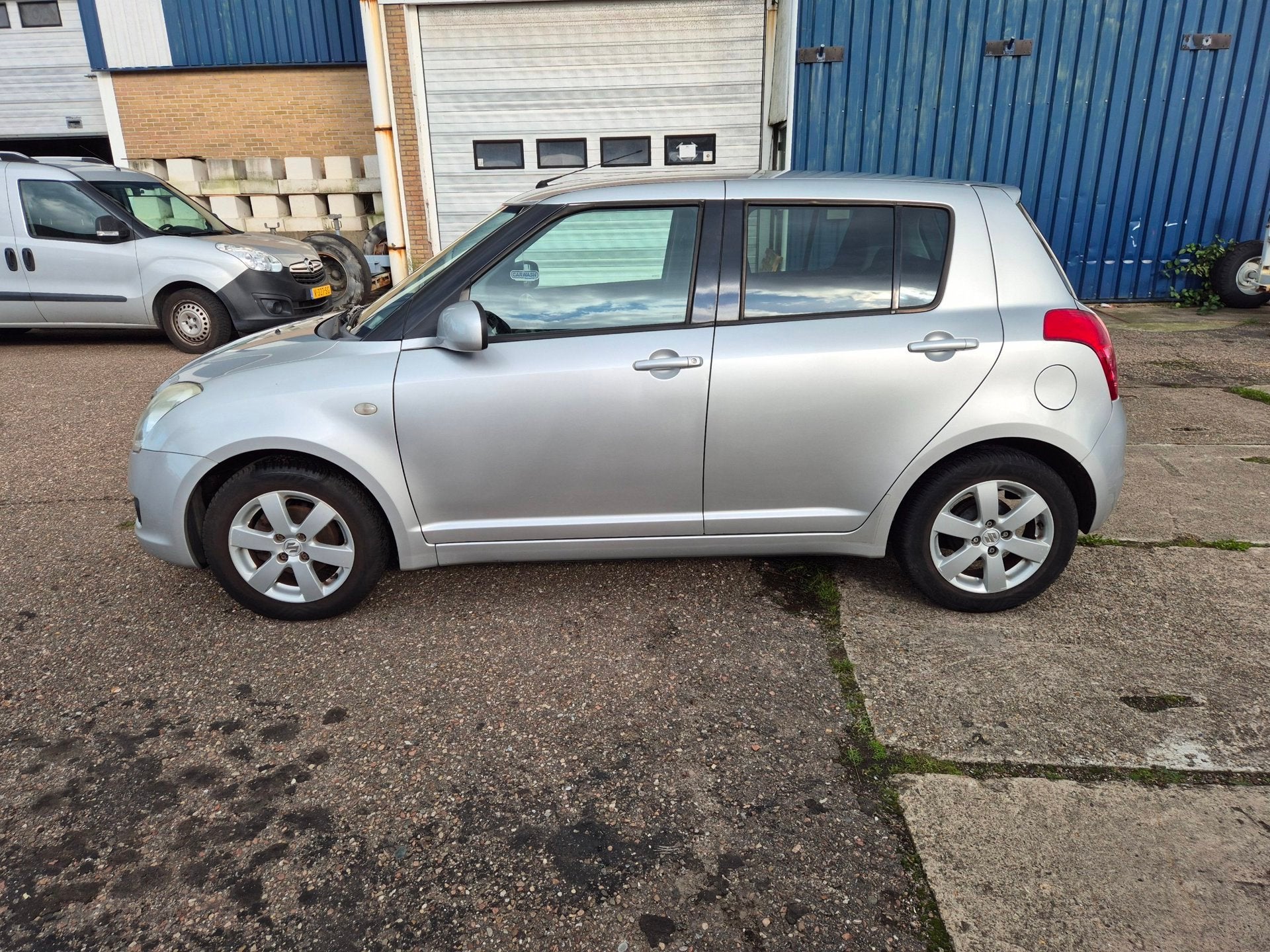 Suzuki Swift 1.3 Comfort/ airco/goed onderh /boekje aanwezig, Auto's, Voorwielaandrijving, Zwart, 400 kg, Swift