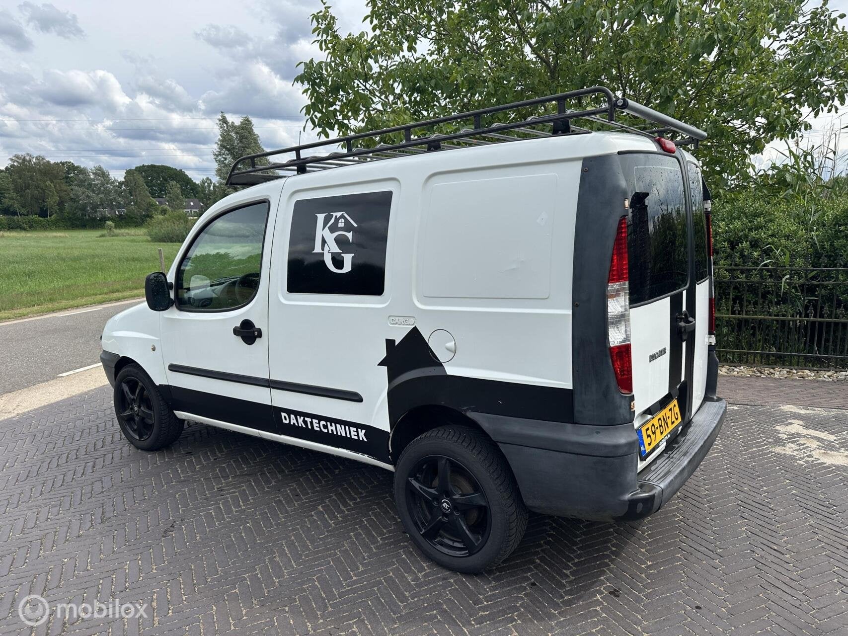 Fiat Doblo Cargo 1.2 Dynamic werkbus met imperiaal NAP✅, Auto's, Bestelauto's, 65 pk, Stof, Gebruikt, 1242 cc