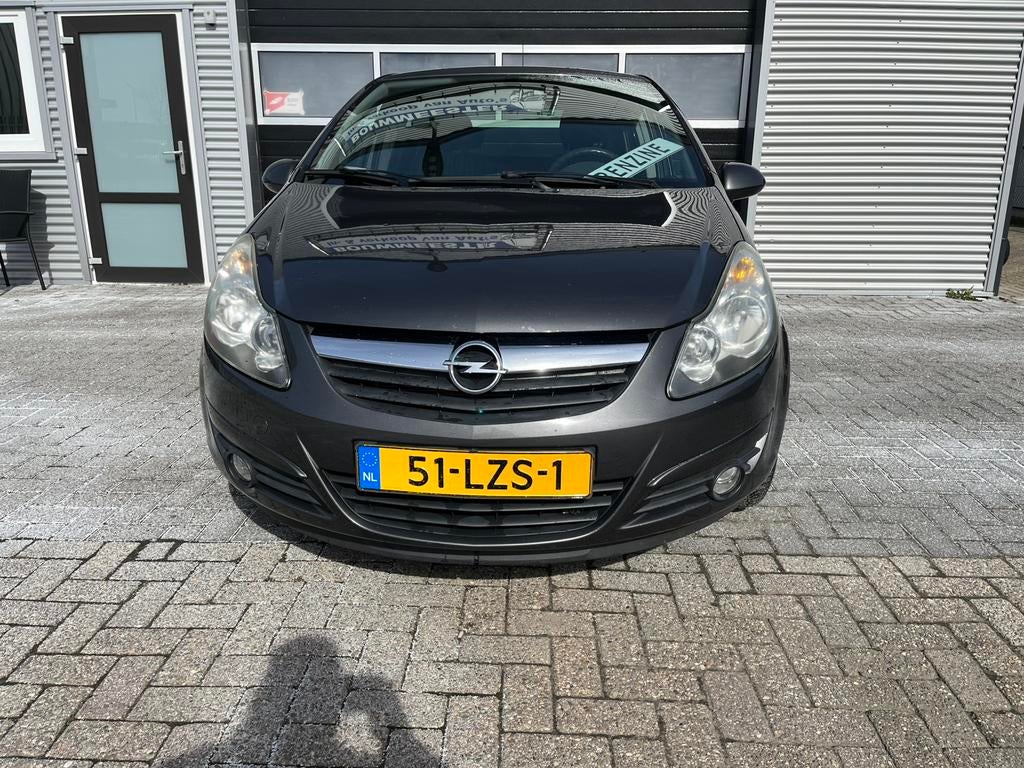 Opel Corsa 1.2-16V 86pk EDITION 5DRS BJ 2010 Grijs, Voorwielaandrijving, Euro 5, Stof, 4 cilinders