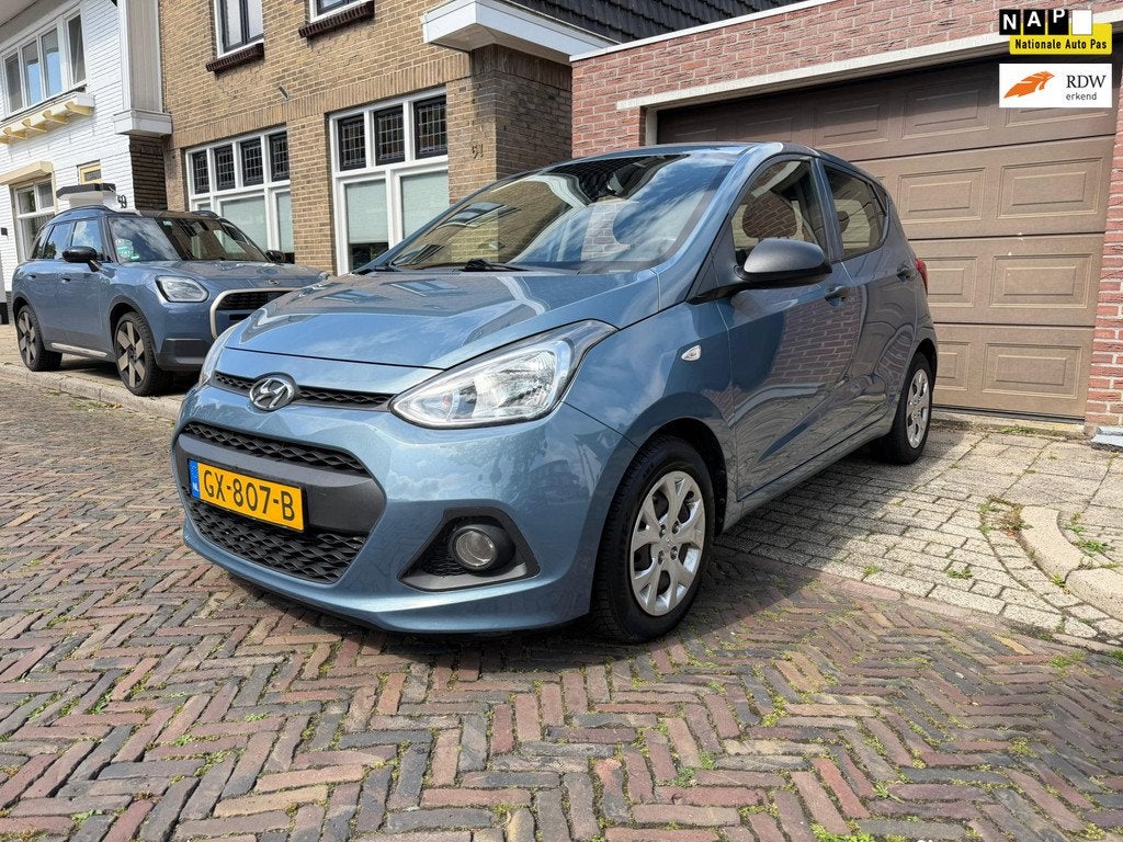 Hyundai I10 1.0i i-Motion, Auto's, Stof, Gebruikt, Blauw, Airbags