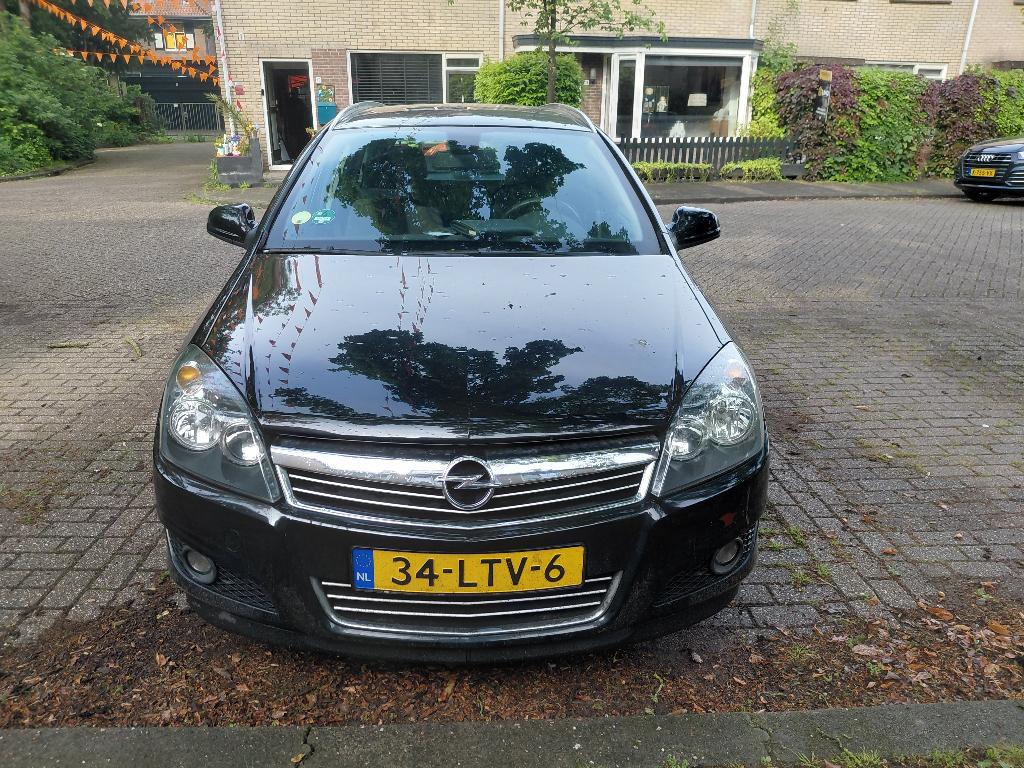 Opel Astra 1.6 16V 85KW St.wgn. 2010 Zwart, Voorwielaandrijving, Zwart, Origineel Nederlands, Stationwagon
