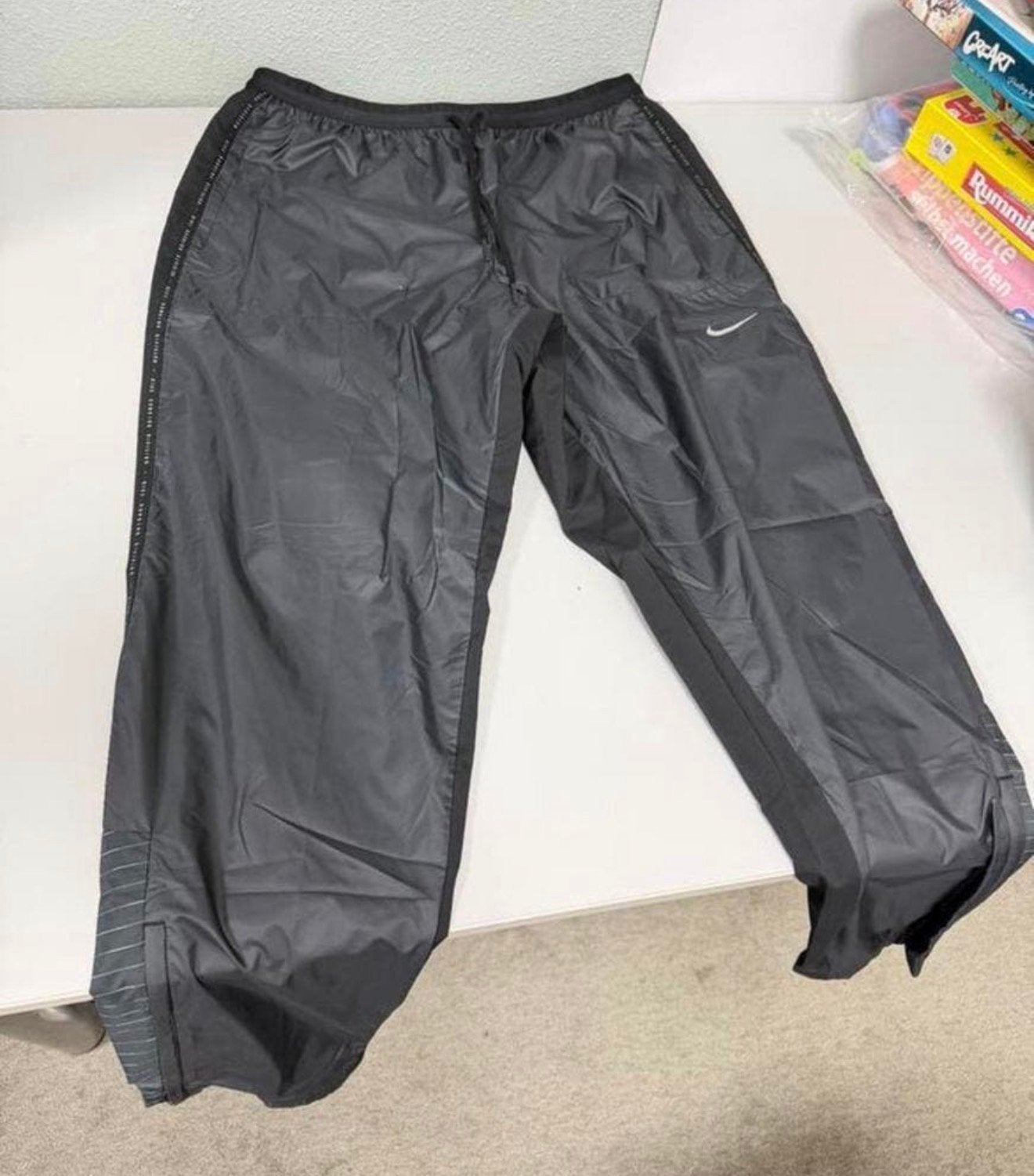 Nike Storm-FIT Running Division broek maat L waterproof zgan, Caravans en Kamperen, Regenbroek, Ophalen of Verzenden, Zo goed als nieuw